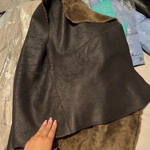 NEWWW brown leather and fur vest. SO TRENDY great for any weather. Leather great